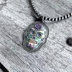 La Catrina Sugar Skull Hand Painted Skeletal Skull Set in Sterling Silver Pendant on navajo pearl necklace copyright chisholm trail designs 2025