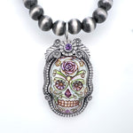 La Catrina Sugar Skull  Pendant Set In Sterling Silver with Purple Faceted Stone copyright chisholm trail designs 2025
