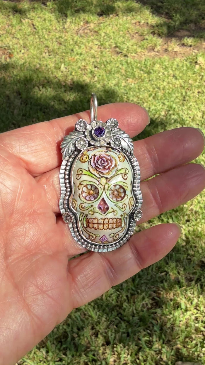 La Catrina Sugar Skull  Pendant Set In Sterling Silver with Purple Faceted Stone copyright chisholm trail designs 2025