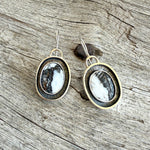 Sterling Silver White Buffalo Dangle Earrings copyright chisholm trail designs 2025